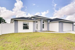 Comfy Lehigh Acres Getaway w/ Yard & Fireplace