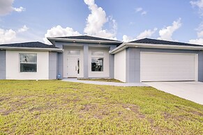 Comfy Lehigh Acres Getaway w/ Yard & Fireplace