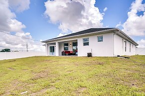 Comfy Lehigh Acres Getaway w/ Yard & Fireplace