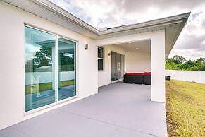 Comfy Lehigh Acres Getaway w/ Yard & Fireplace