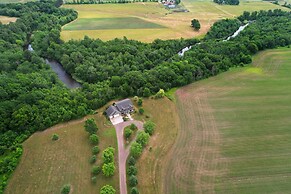 Riverfront Bliss in Rice Lake: Deck, Grill & Hike!