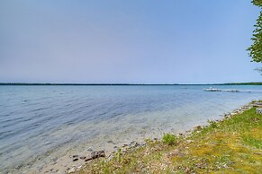 Waterfront Torch Lake Cottage w/ Dock & Fire Pit!