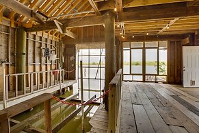 Golden Meadow Getaway: Waterfront Retreat w/ Deck