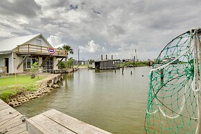 Golden Meadow Getaway: Waterfront Retreat w/ Deck