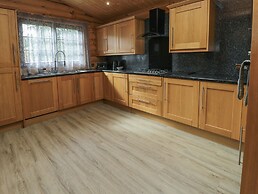 Welcome Hjem Log Cabin