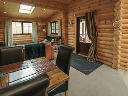 Welcome Hjem Log Cabin