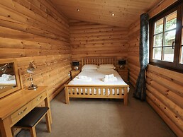 Welcome Hjem Log Cabin
